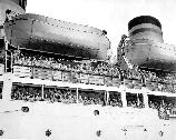 Hundreds of thousands of service men came home from the Pacific on huge military transport ships. Once they landed at Fort Mason, they were escorted to the Staging Area, where they were fed an American meal, their papers were processed and they were reunited with their families.