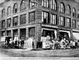 Supplies piled on the sidewalk in front of the John B. Agen store on Western Avenue. Univ. of Washington Libraries, special collection SEA1335