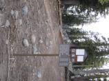 Look for the trailhead marker to the right of the restrooms at the end of the parking lot.