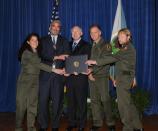 Olympic National Park rangers receive the Department of the Interior Valor Award. From left, Sanny Lustig, Scot Bowen, Secretary of the Interior Ken Salazar, Mike Danisiewicz and Bryan Bell.