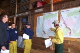 Briefing: Every prescribed burn begins with a briefing after a copy of the Incident Action Plan (IAP) is distributed to all personnel. Division supervisors carefully go over the details of strategy and equipment to be sure everyone understands the operational plan.