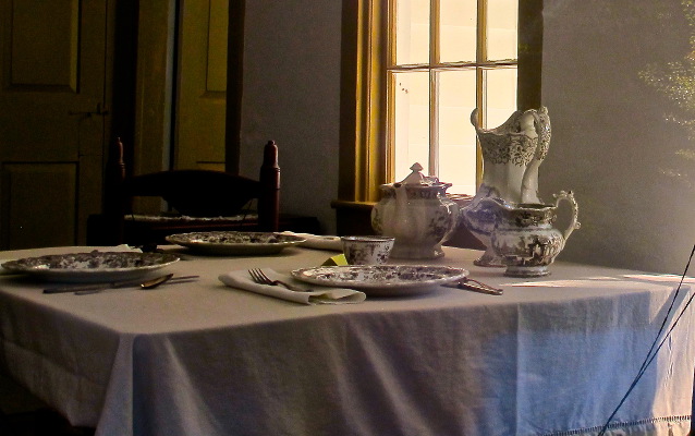 Dishes set on the kitchen table inside the Clara Barton Homestead