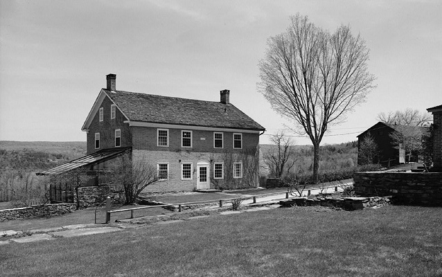black and white photo of a shaker building in tyringham
