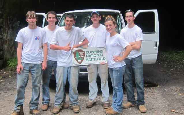 Cowpens National Battlefield YCC stand in front of their van at the tunnel leading to the Road to Nowhere.