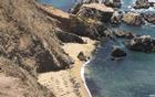 A view from above of the main elephant seal colony at Point Reyes Headlands.