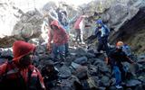 Students entering cave