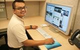 Photo of Park Ranger Eymard Bangcoro posting to the National Park of American Samoa's Facebook, Twitter, and blog pages.