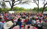 BBQ participants enjoy a western show