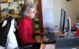 Volunteer uploading photos to the Digital Archaeological Record (tDAR)