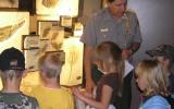 2nd grade students learn about fossilized fish from Ranger John