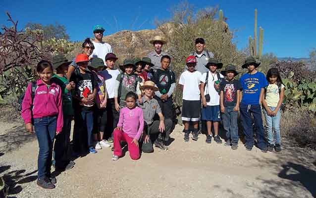 Children’s Hiking Club student hikers with leaders in Saguaro National Park