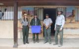Recycling committee members in front of the old trading post storage building