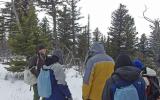 Education intern speaking with park visitors