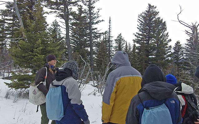Education intern speaking with park visitors