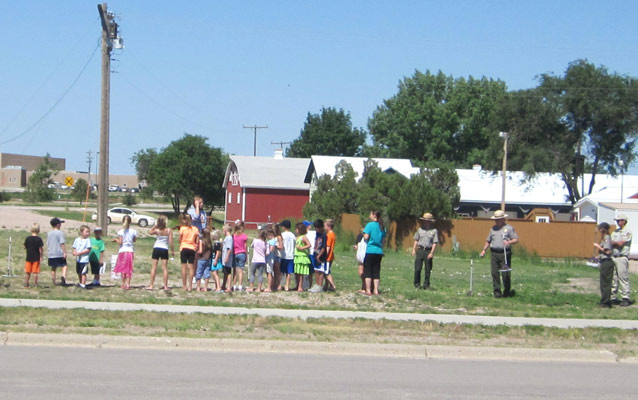 Students learn the fundamentals of rocketry and thrust through the building and launching of air rockets.