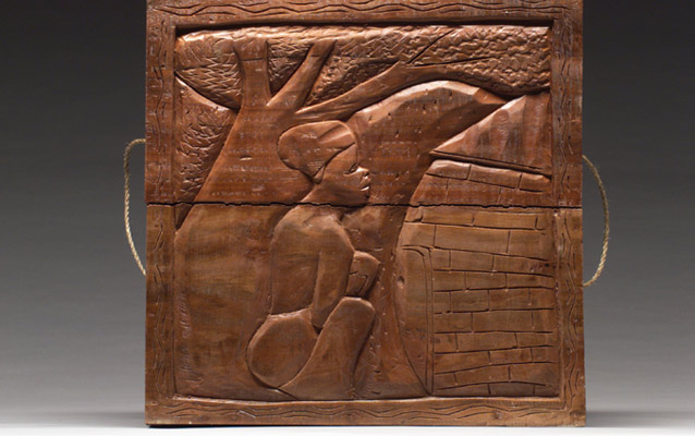 Wood carved reburial coffin with female figure