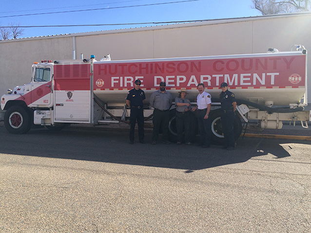 NPS and Fire Department staff with donated water tender