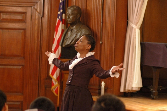 Kathy Hudson performs as Harriet Tubman for students