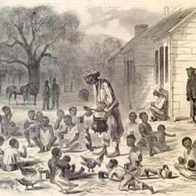 Print of freed slaves outside a school