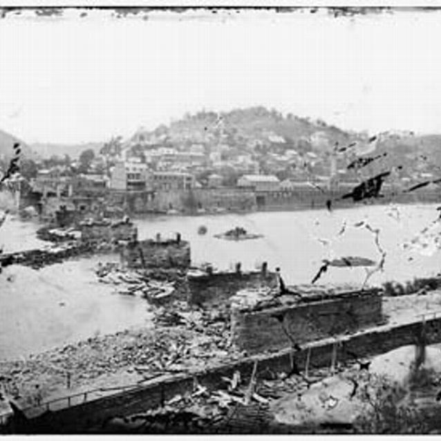 Photograph of the Railroad bridge in ruins at Harpers Ferry in 1862
