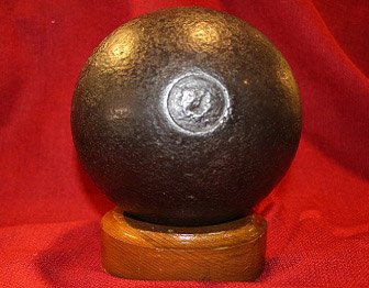 Cannonball on wood stand