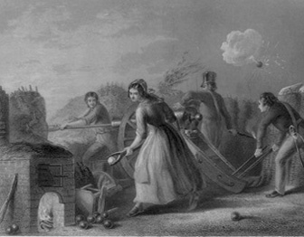 A women uses tongs to lift a red hot cannon ball as a crew of men loads a cannon behind her.