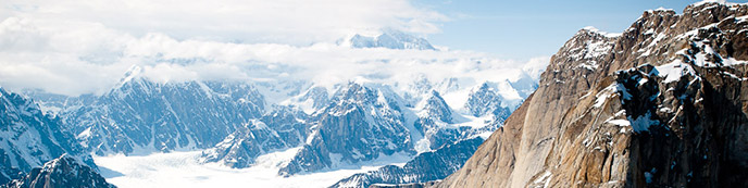 aerial image of glacier, steep mountains