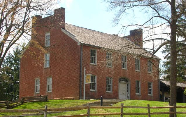 A photograph of the historic Mount Washington Tavern which is now a museum