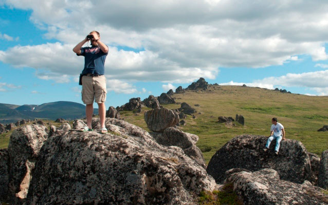 Hikers take in the views on the Alaskan tundra