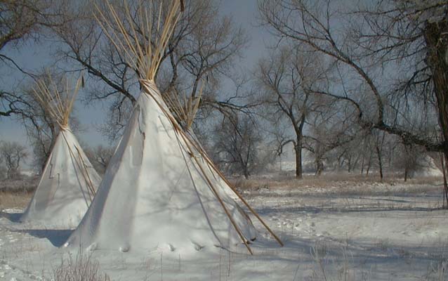 Two tipis in the snow