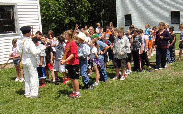 A school group prepares to reenact the Trail of Tears program.