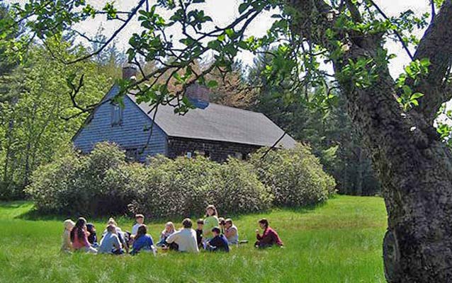 A fourth grade classes uses the Carroll Homestead as an outdoor classroom.