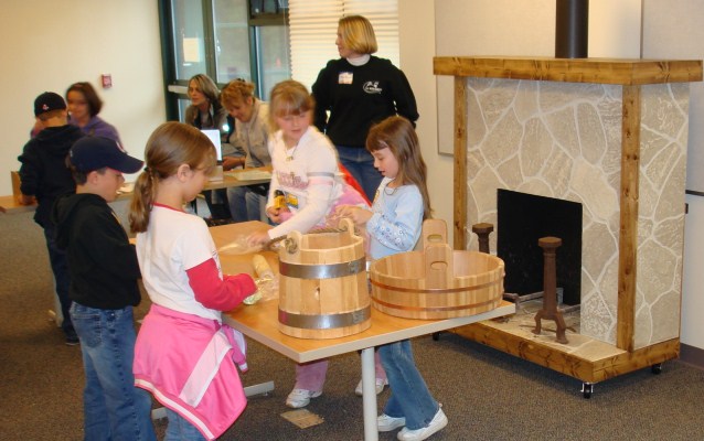 Students doing the chores in the hands-on activities section of the program