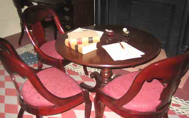 Photo of the parlor at the M'Clintock House, where the Seneca Falls convention was planned.