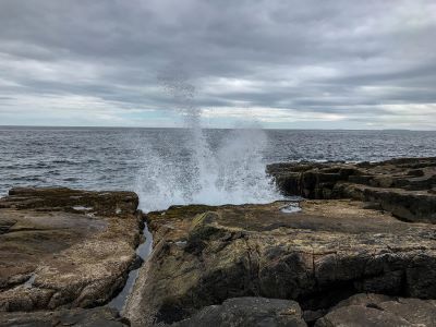 waves crashing against the rocks