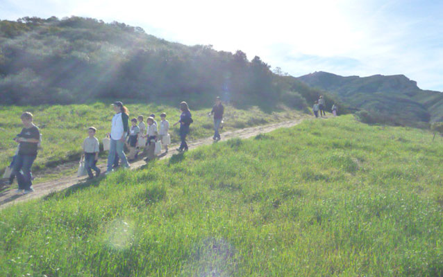 Students go on a hike as part of their program
