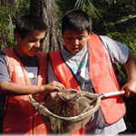 Sixth graders getting their hands dirty to better understand the swamp