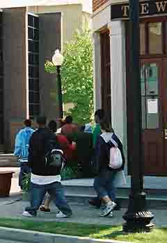 Students in front of the Wright Cycle building. Students in front of the Wright Cycle building.