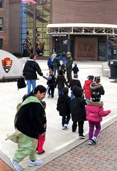 Students in front of the Wright Cycle building. Students in front of the Wright Cycle building.