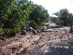 Damage to gate and road on Montezuma Canyon Rd.