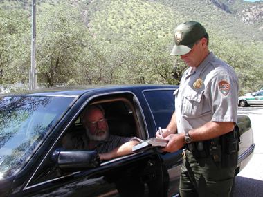 Park ranger and visitor