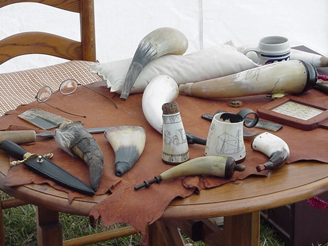 bovine horns and scrimshaw tools on a table