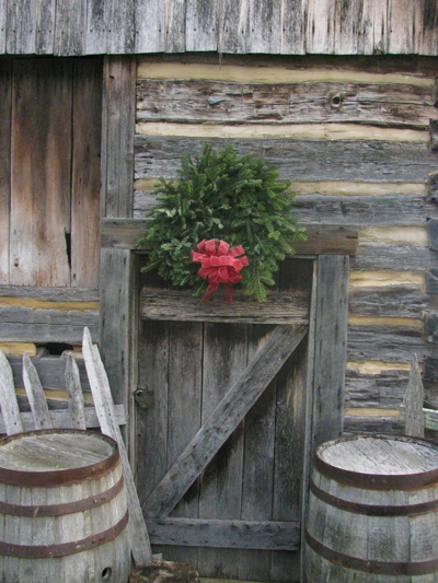 wreath on rustic cabin