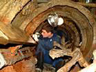 Small image of a scientist at work on the H.L. Hunley recovery