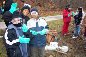 Children testing water quality