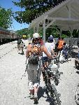 11 Cyclists Await the Train
