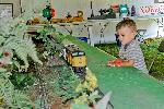 21 Boy Watches a Model Train