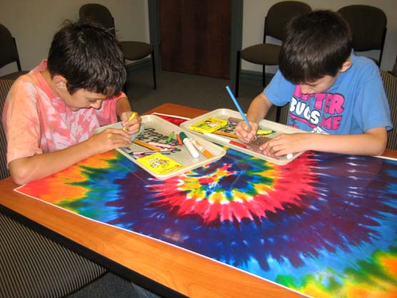 Children making crafts outside the Wright-Dunbar Interpretive Center.