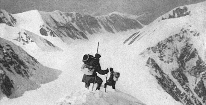 historic black and white image of two climbers on Mount McKinley