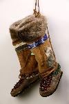 Walks in the Wilderness: Heart and Sole, Jona Van Zyle, 2004. Materials: Beads, found objects, fabric, beaver fur, caribou antler buttons, dog tags